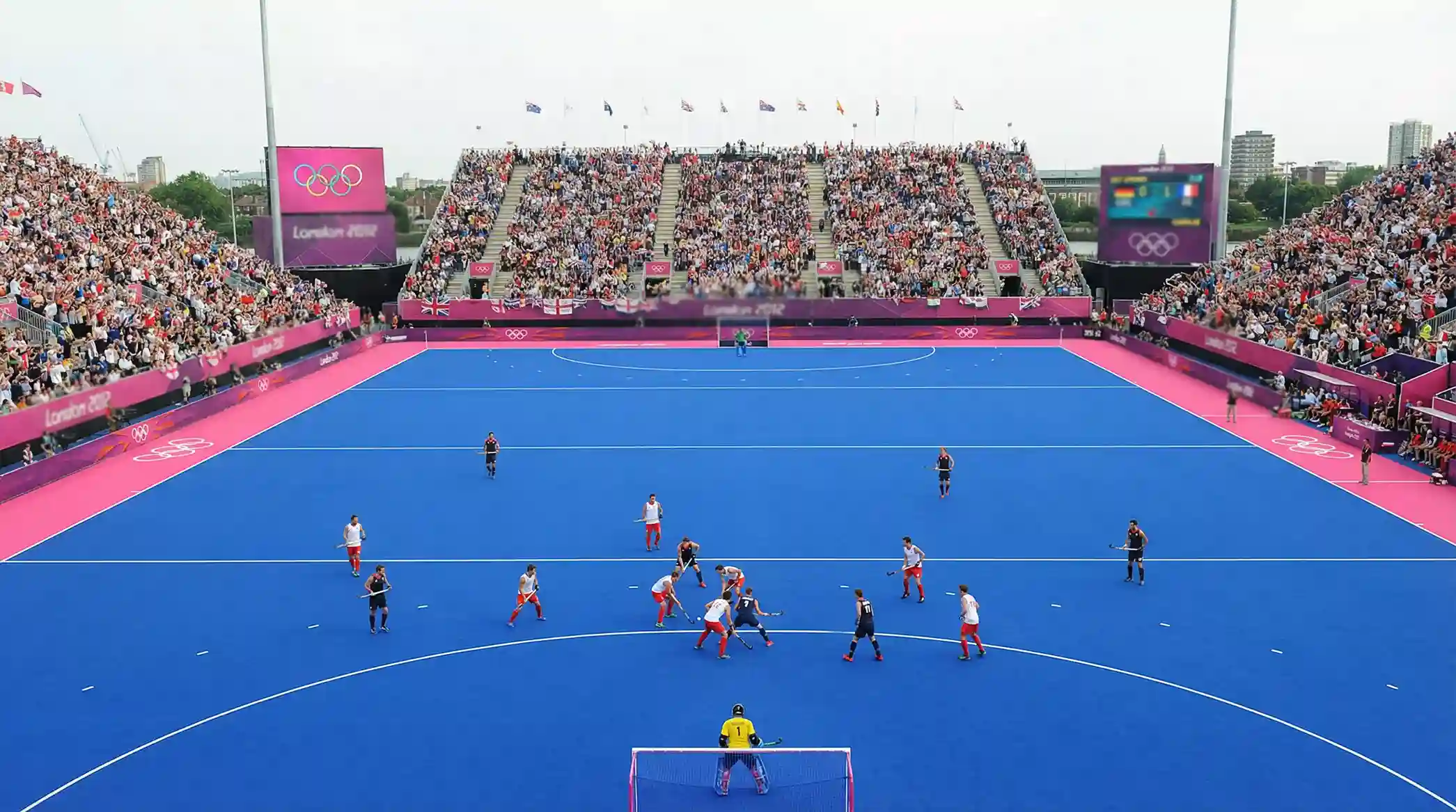 Hockeyfinale in de Riverbank Arena met blauw veld en roze stroken